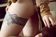 Foto: tempat paling seksi untuk tato Tato intim dan lambang zodiak